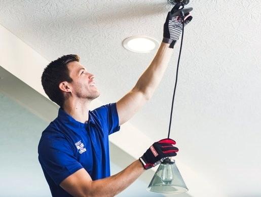 Electrician Installing Lighting Fixture - Electrician Near Me in Franklin